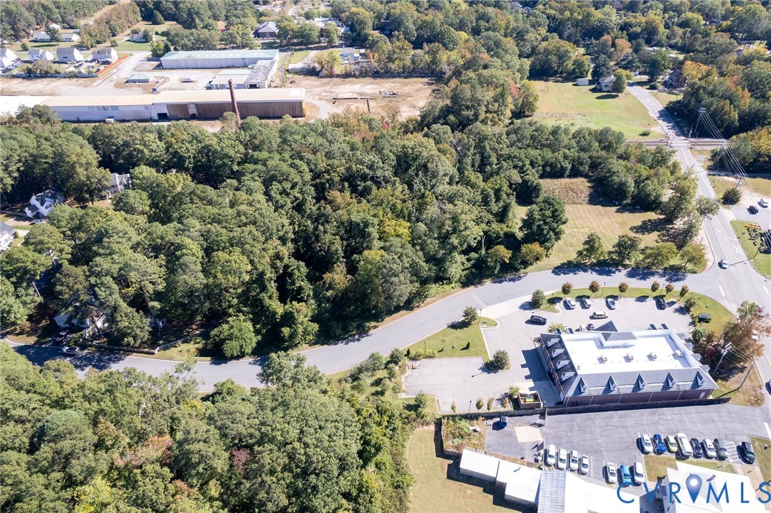 3002 Mountain Road Glen Allen, VA 23060 - Photo 9 of 13 an aerial view of a house with a yard and lake view
