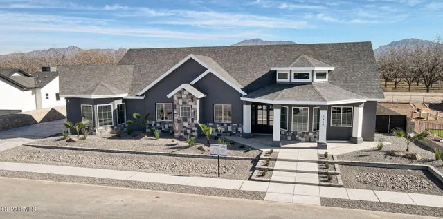 a front view of a house with a porch