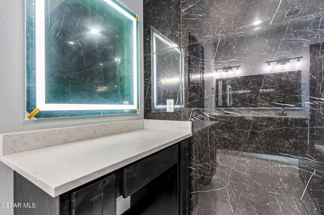 a kitchen with a sink and a window