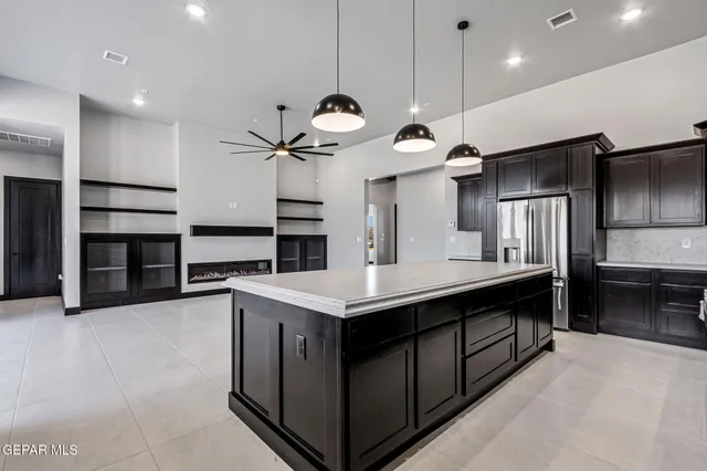 a bathroom with a sink a vanity and a mirror