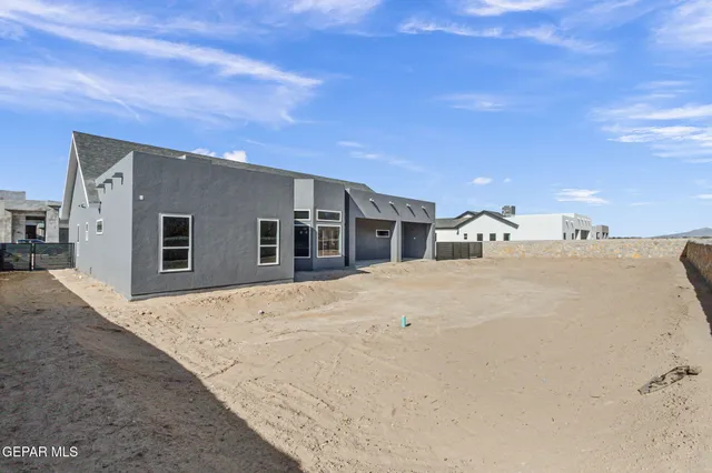 a view of house with yard