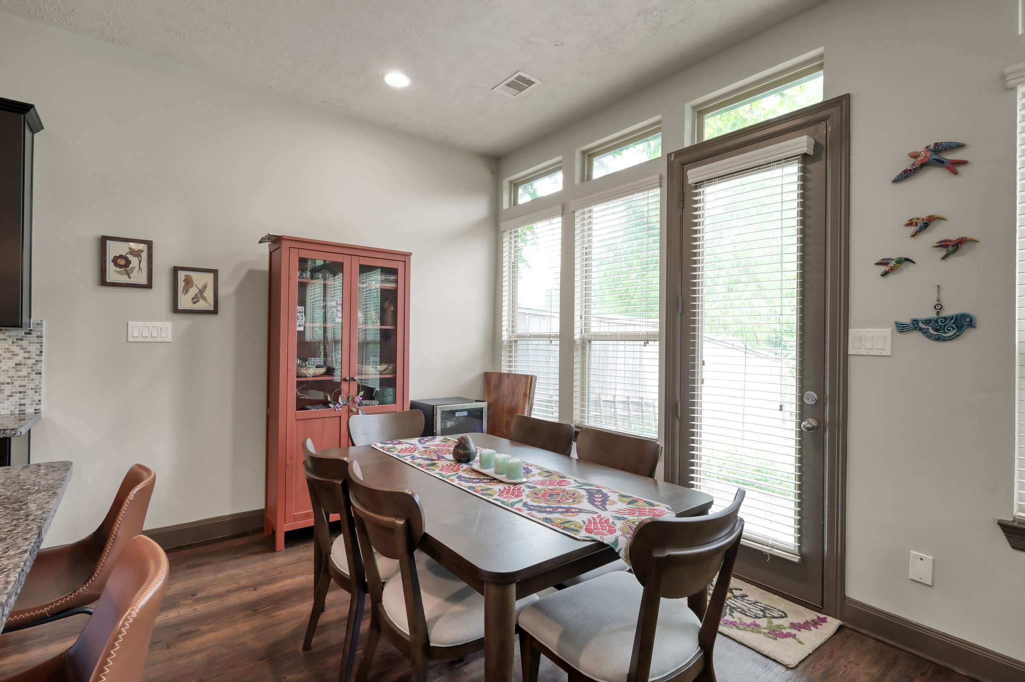 18 Aventura Place Spring, TX 77389 - Photo 11 of 43 a view of a dining room with furniture window and wooden floor