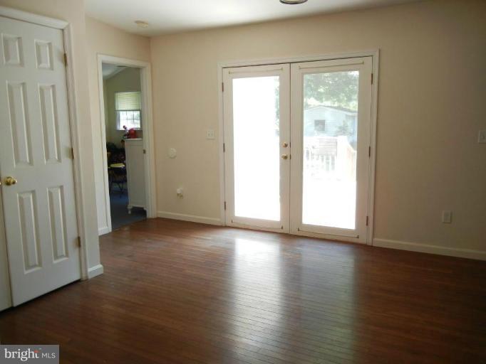 107 Monroe Manor Road Stevensville, MD 21619 - Photo 13 of 21 family room extended to rear foyer
