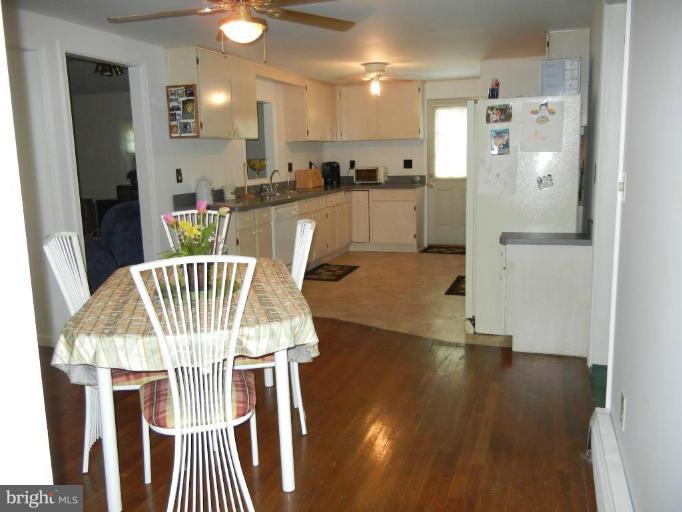 107 Monroe Manor Road Stevensville, MD 21619 - Photo 18 of 21 dining area to kitchen