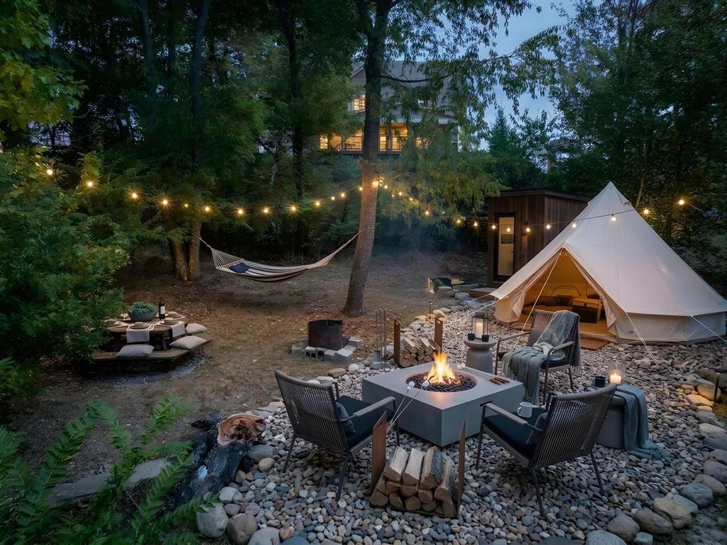 216 Lori Road Gibsonia, PA 15044 - Photo 47 of 49 Virtual rendering of the upper wooded lot reimagined as a private camping and retreat space, inspired by how the sellers’ children grew up using this area as their own adventure zone and outdoor escape.