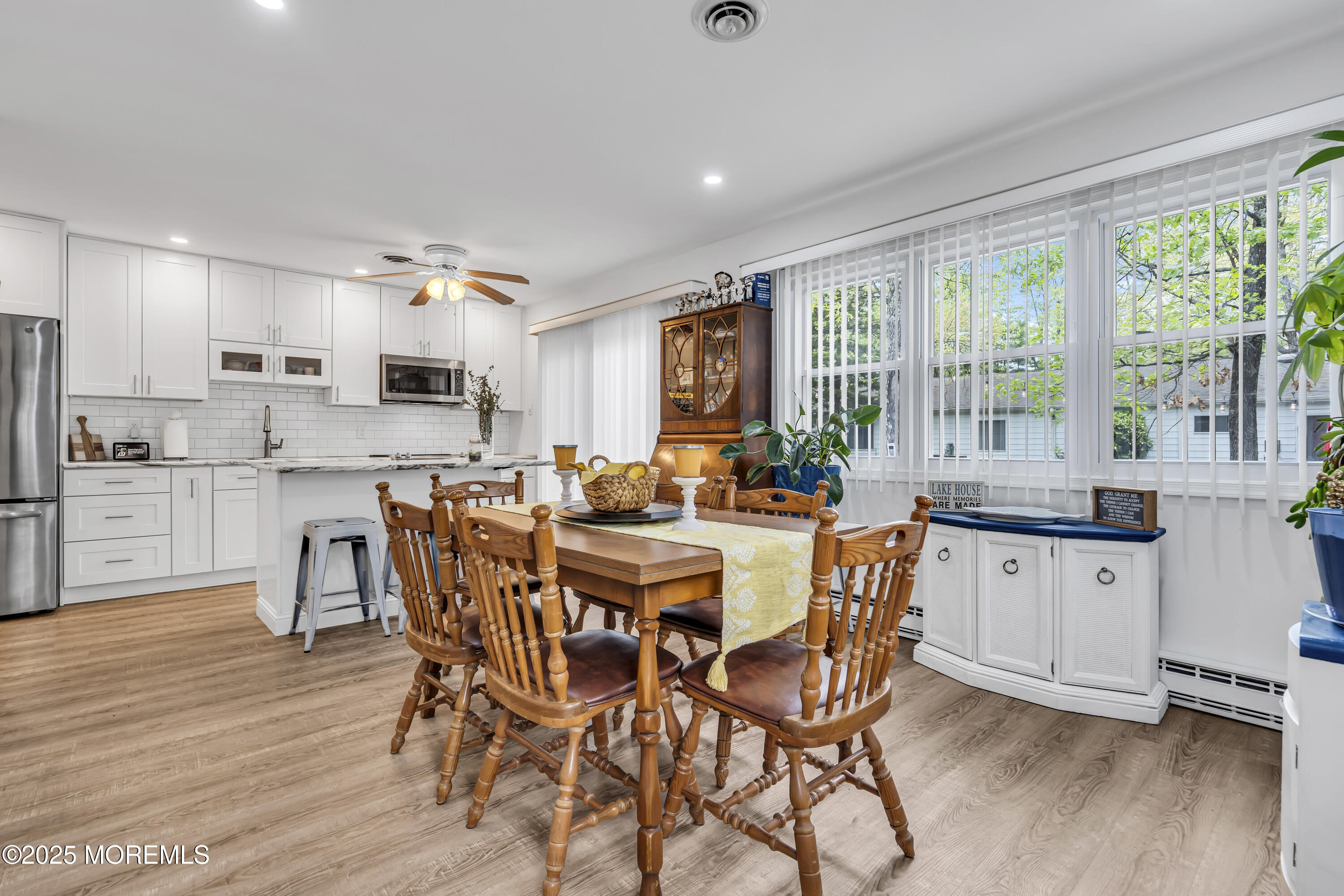 2 Oregon Drive, Unit A Whiting, NJ 08759 - Photo 11 of 26 a view of a dining room with furniture window and wooden floor
