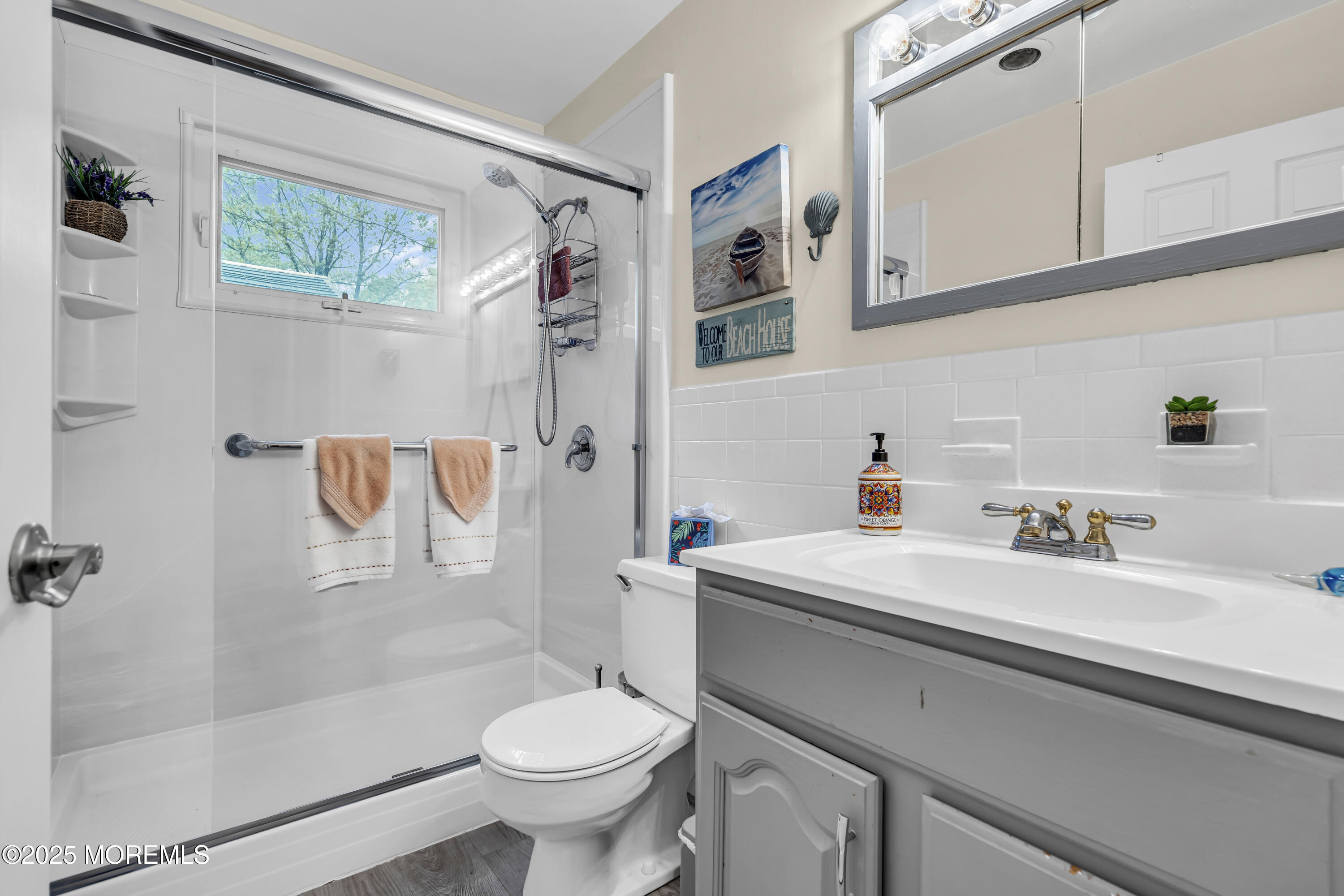 2 Oregon Drive, Unit A Whiting, NJ 08759 - Photo 16 of 26 a bathroom with a sink toilet and shower