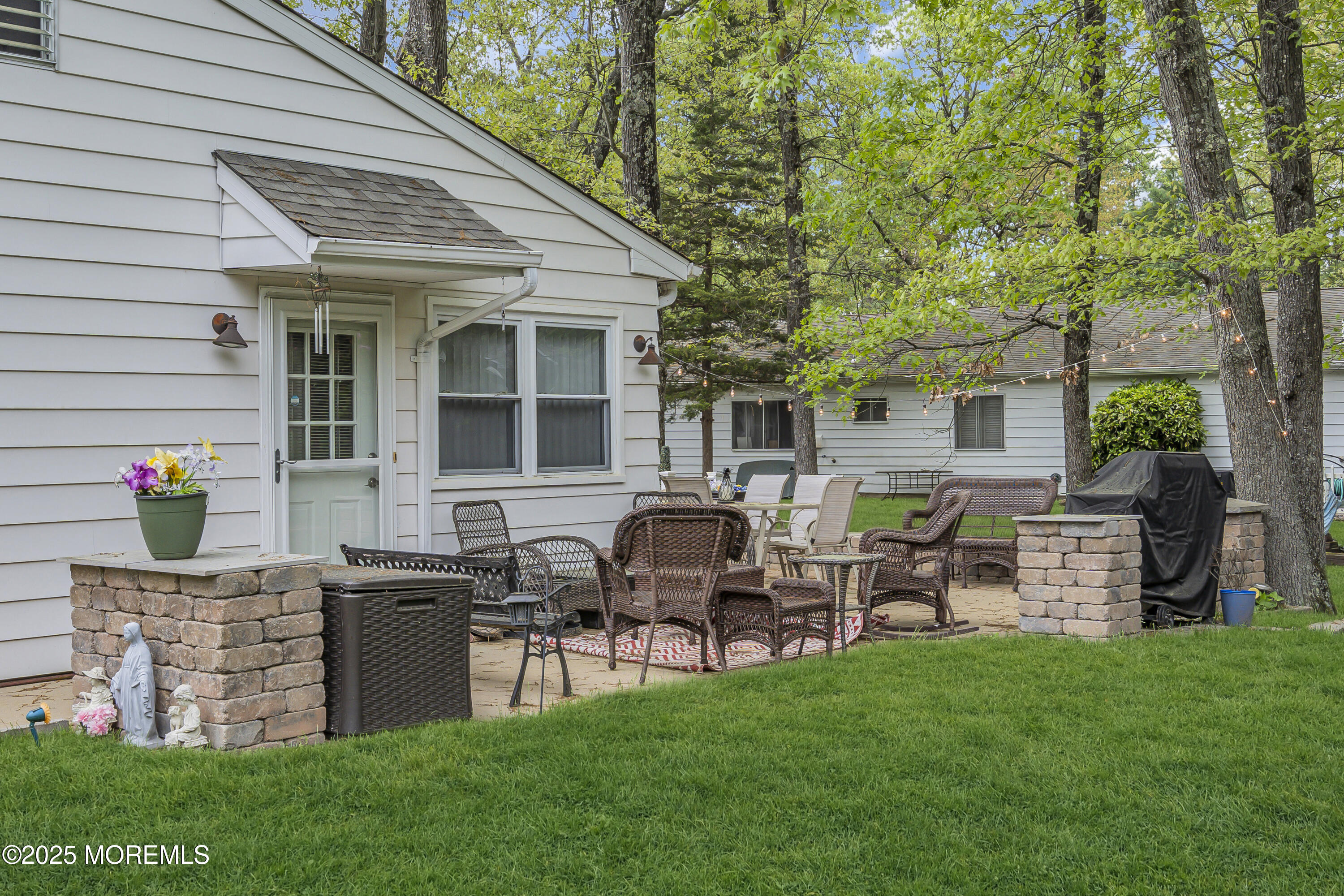 2 Oregon Drive, Unit A Whiting, NJ 08759 - Photo 21 of 26 a view of a house with backyard and a tree