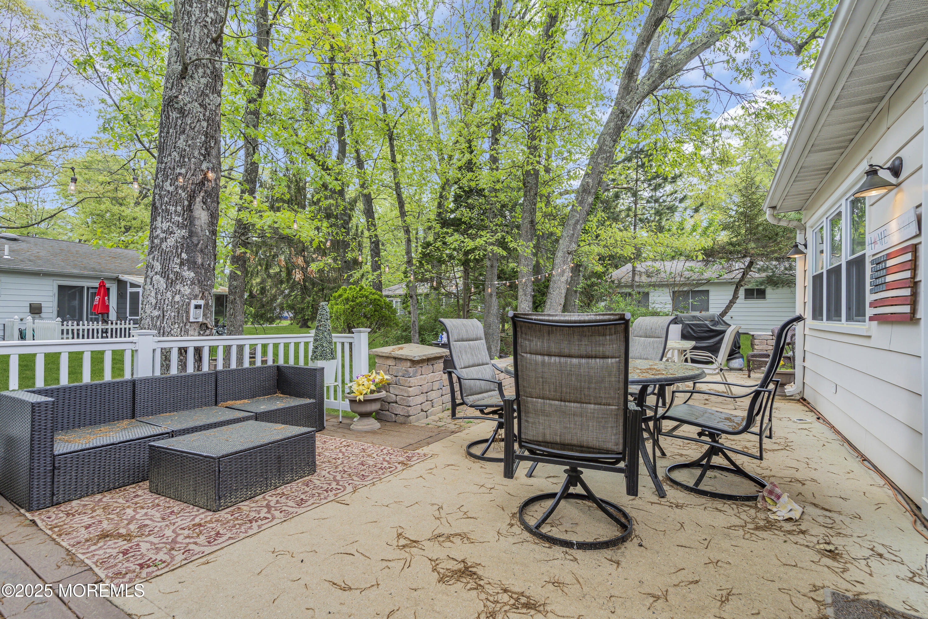 2 Oregon Drive, Unit A Whiting, NJ 08759 - Photo 25 of 26 a view of a chairs and fire pit in the backyard