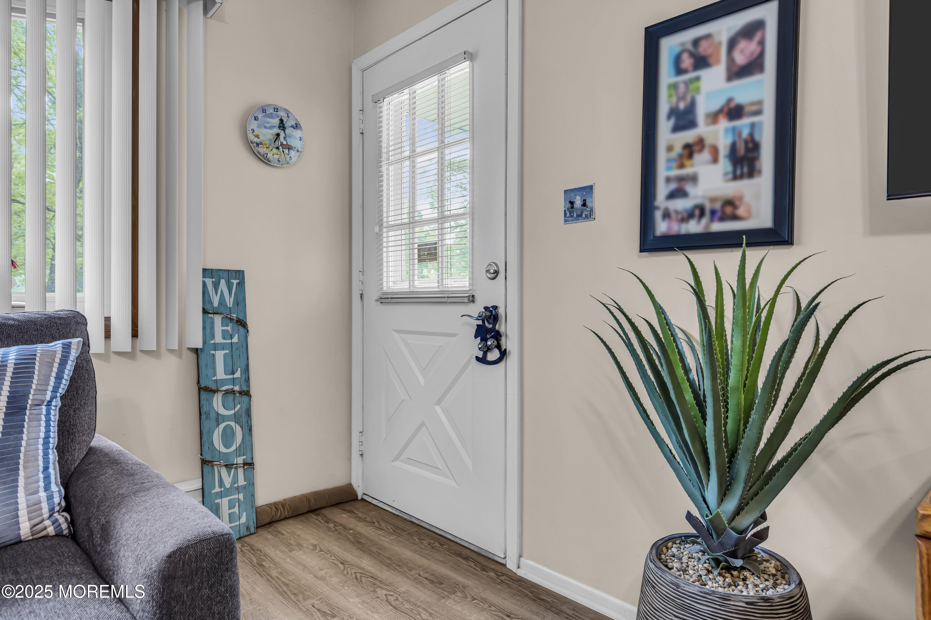 2 Oregon Drive, Unit A Whiting, NJ 08759 - Photo 4 of 26 a view of a hallway with furniture and a potted plant