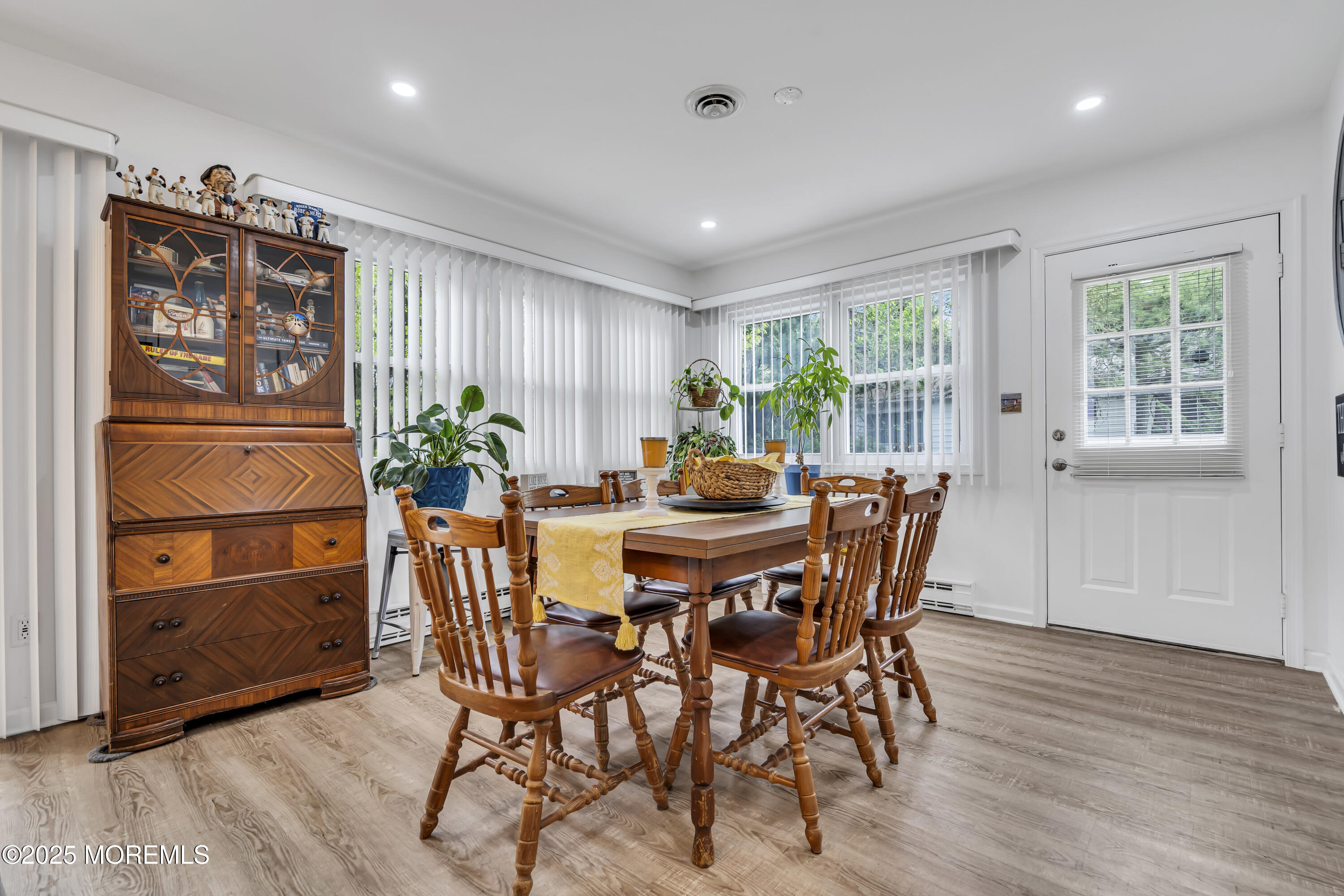 2 Oregon Drive, Unit A Whiting, NJ 08759 - Photo 10 of 26 a view of a dining room with furniture window and wooden floor