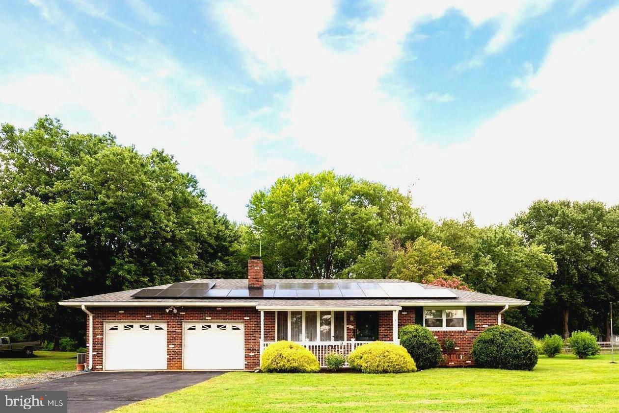 1401 Calvert Road Chester, MD 21619 - Photo 1 of 33 a view of a yard in front of house