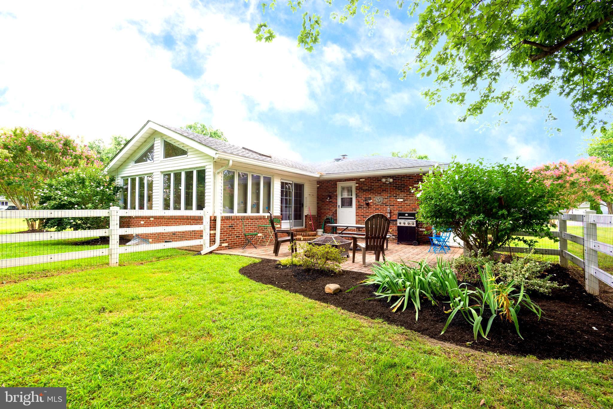 1401 Calvert Road Chester, MD 21619 - Photo 12 of 33 a front view of a house with garden