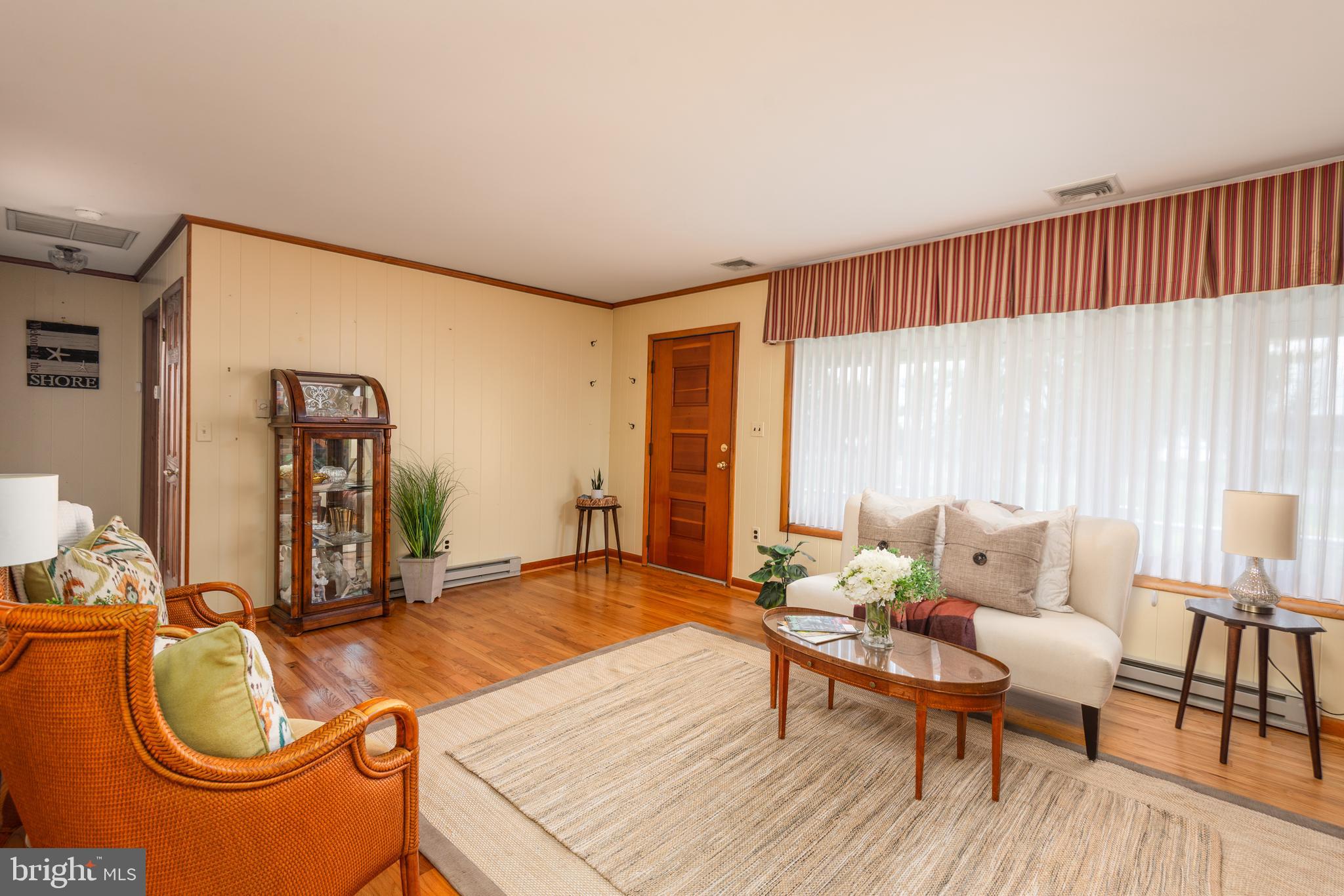 1401 Calvert Road Chester, MD 21619 - Photo 15 of 33 a living room with furniture and wooden floor