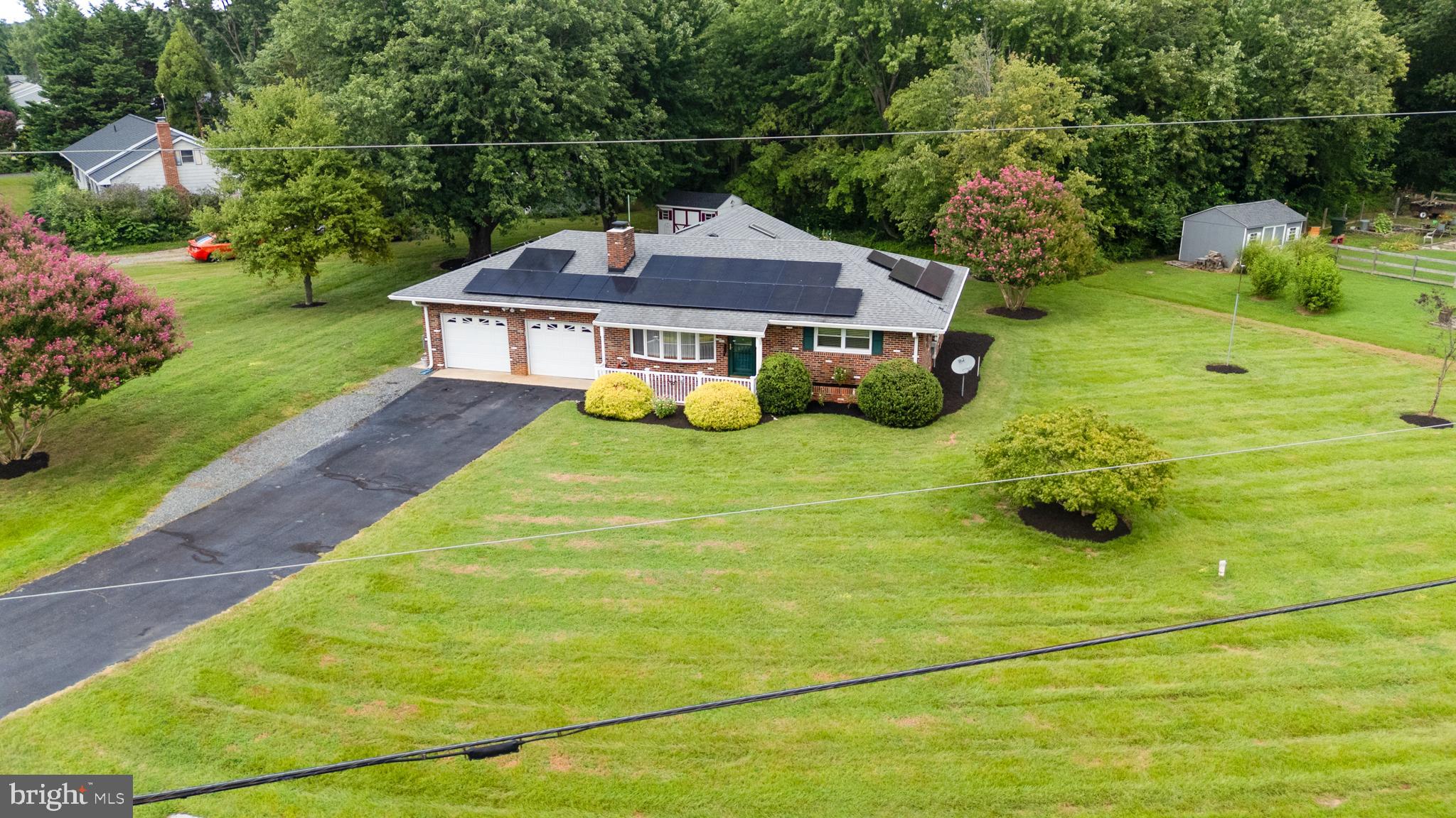 1401 Calvert Road Chester, MD 21619 - Photo 23 of 33 a front view of a house with yard