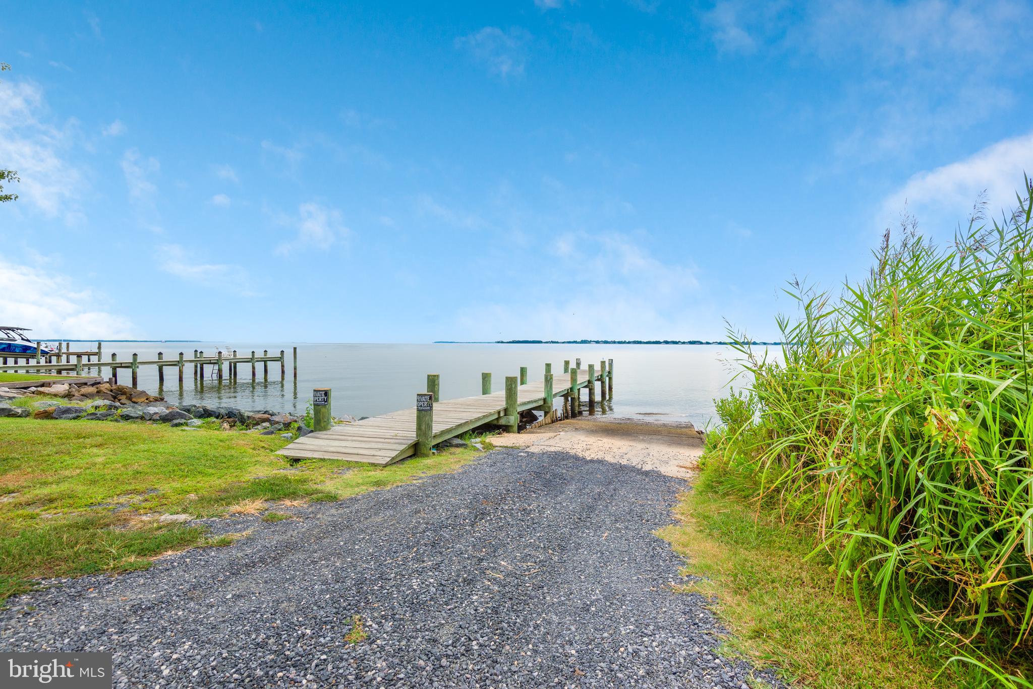 1401 Calvert Road Chester, MD 21619 - Photo 29 of 33 a view of a swimming pool with an outdoor space and seating area