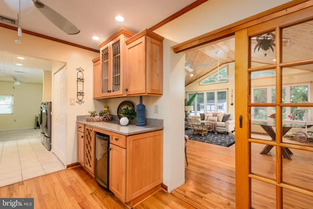 a kitchen with stainless steel appliances granite countertop a stove and a refrigerator