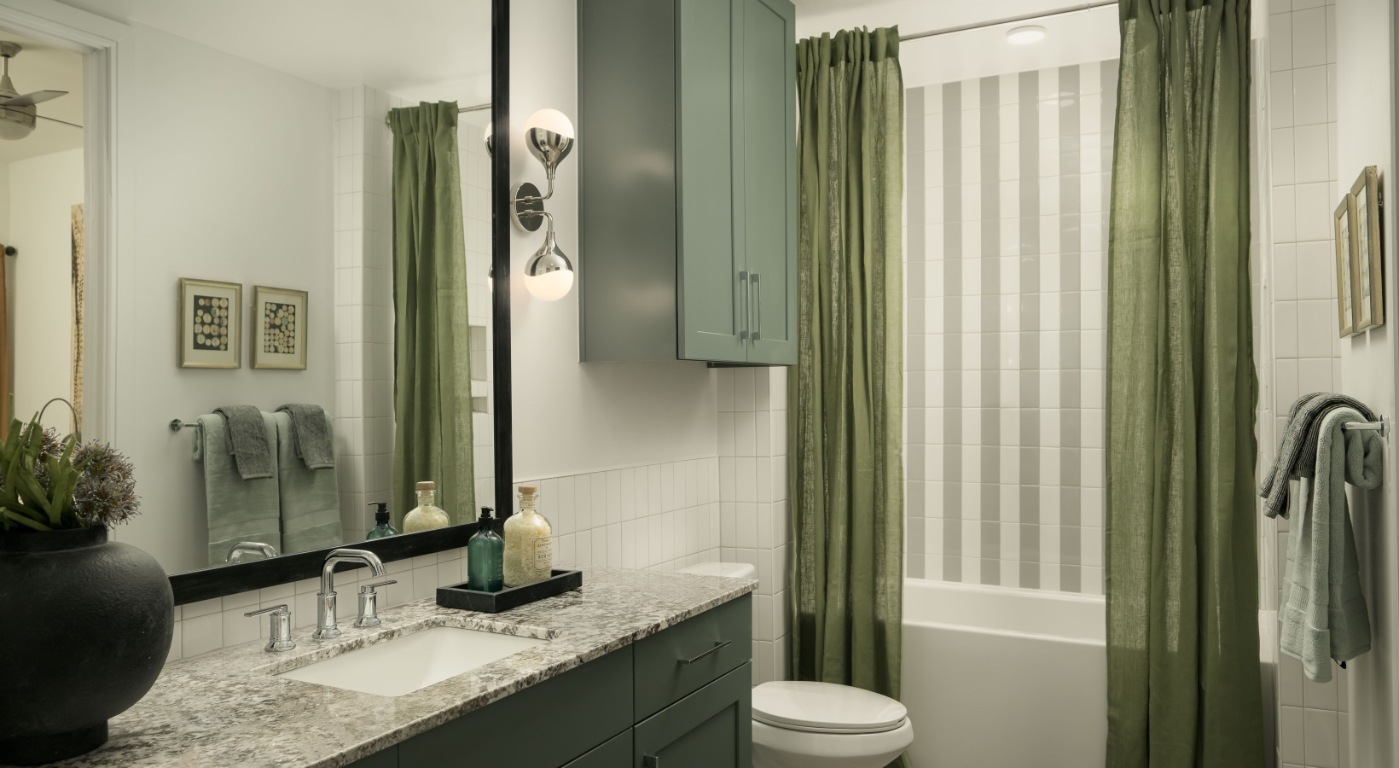10520 Lakeline Mall Drive, Unit 358 Austin, TX 78717 - Photo 7 of 22 a bathroom with a granite countertop sink toilet and shower