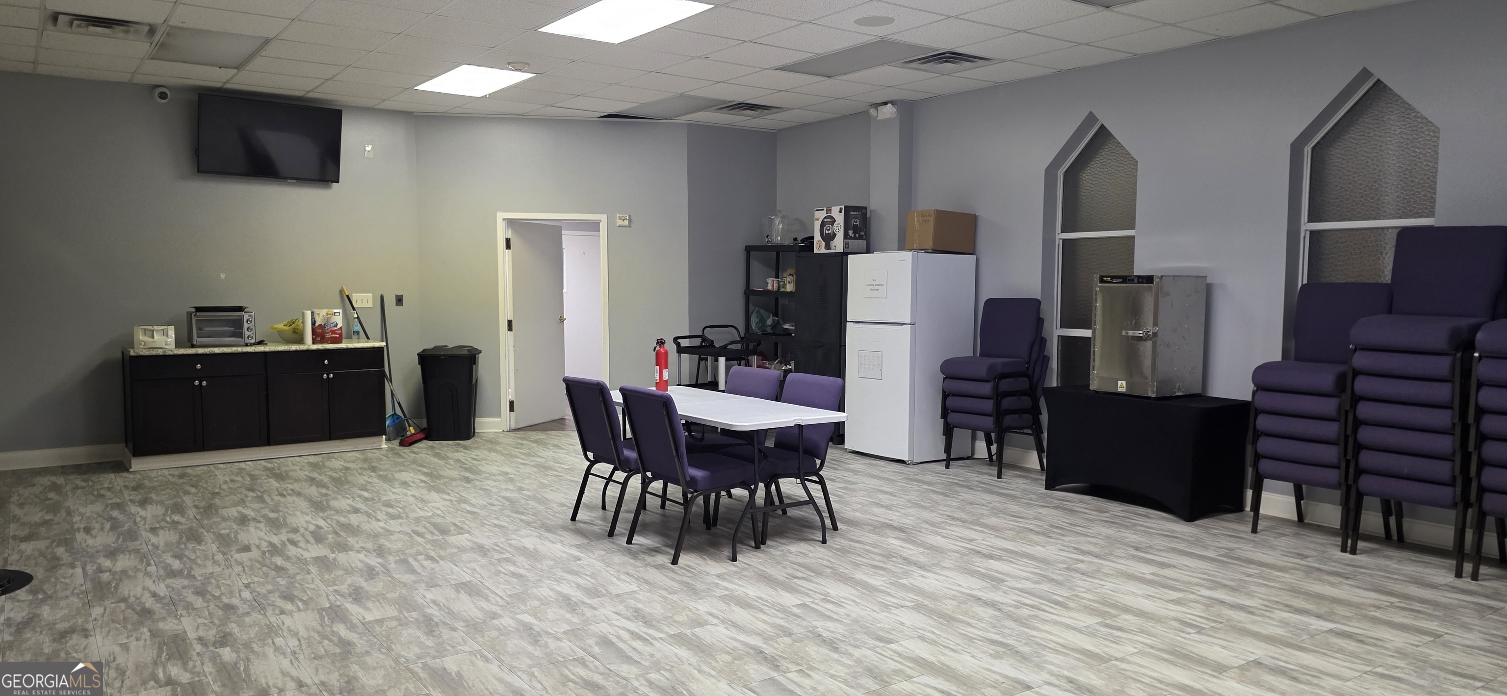 6270 Red Oak Road Atlanta, GA 30349 - Photo 14 of 43 a dining room with furniture and wooden floor