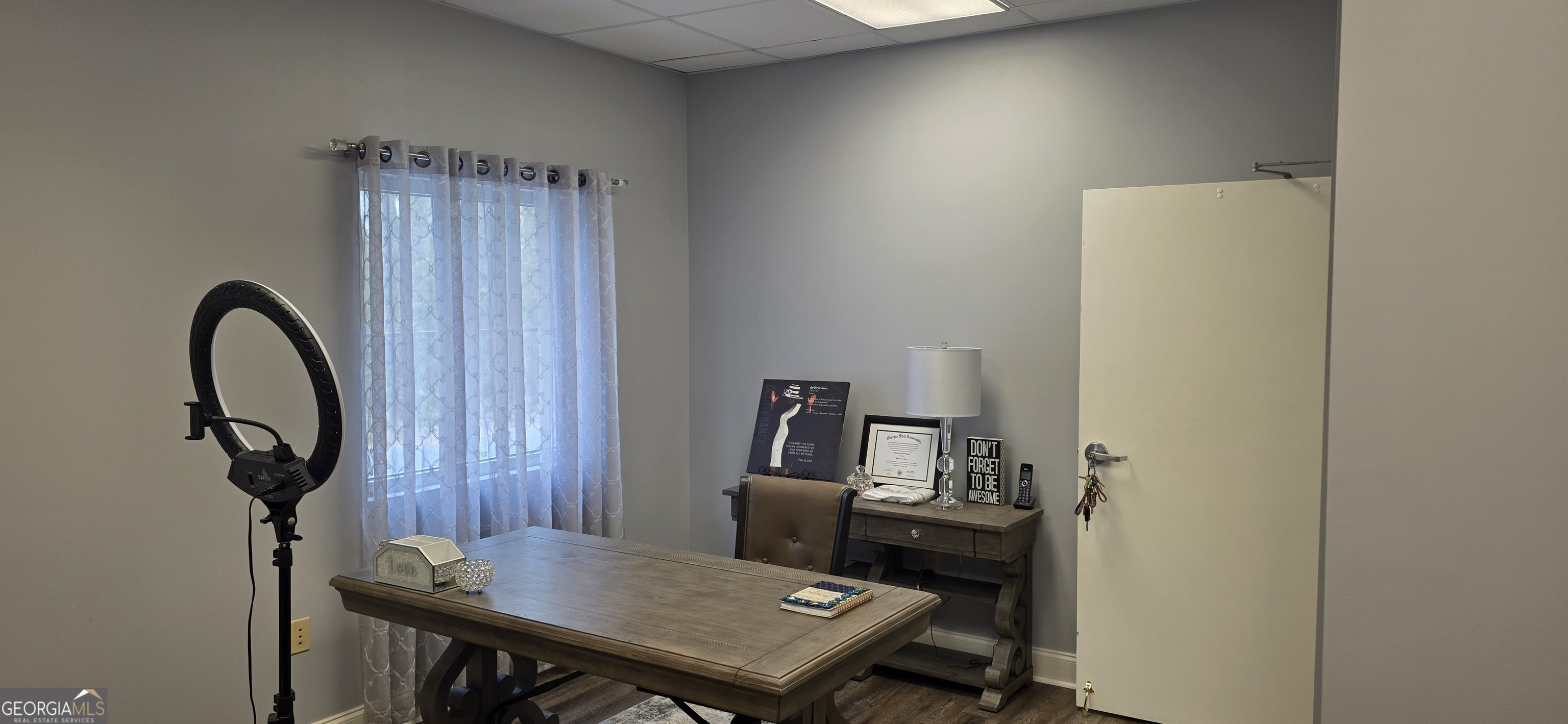 6270 Red Oak Road Atlanta, GA 30349 - Photo 30 of 43 a view of a workspace room with furniture and wooden floor