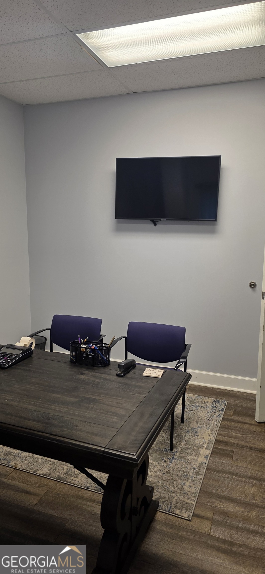6270 Red Oak Road Atlanta, GA 30349 - Photo 32 of 43 a living room with furniture and a flat screen tv