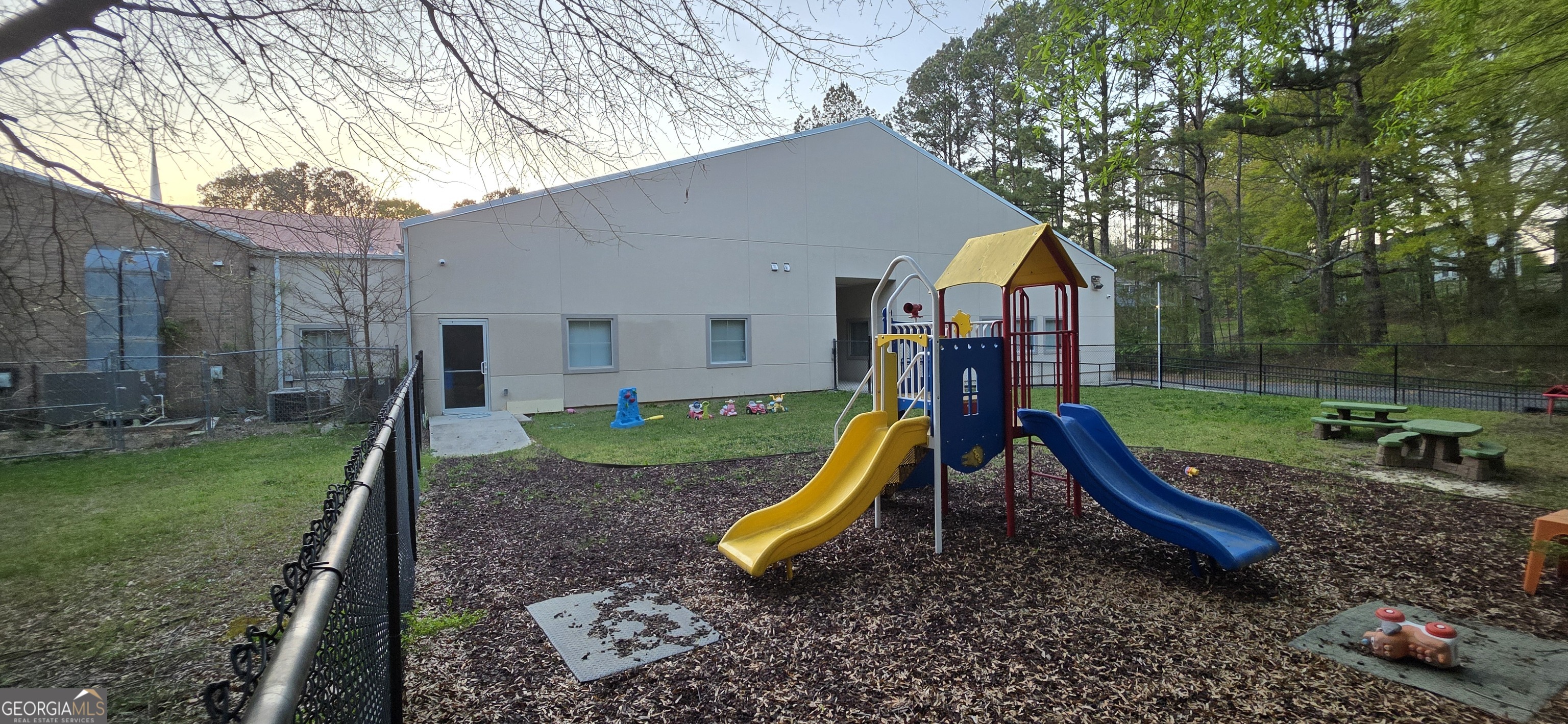 6270 Red Oak Road Atlanta, GA 30349 - Photo 41 of 43 a view of a park with a slide