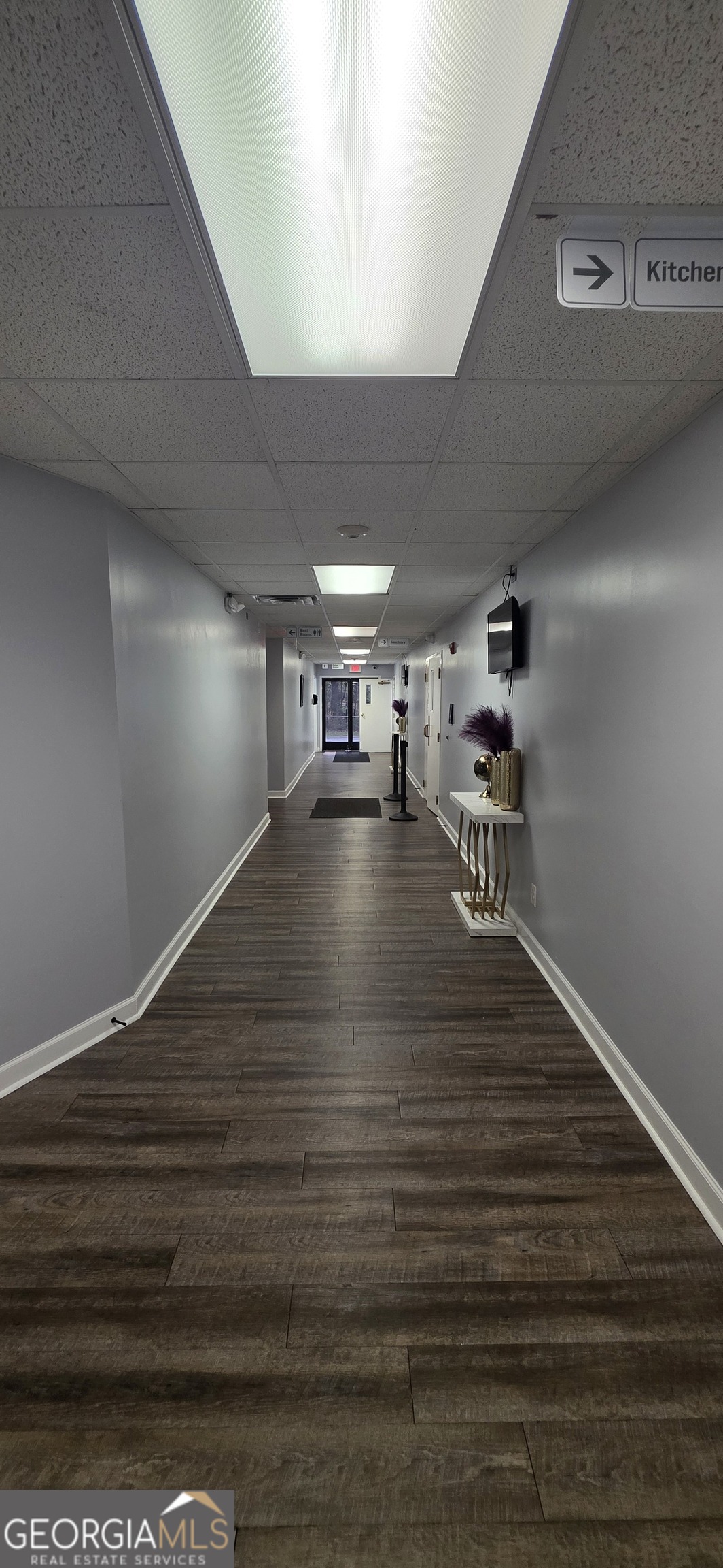6270 Red Oak Road Atlanta, GA 30349 - Photo 7 of 43 a view of empty room with wooden floor
