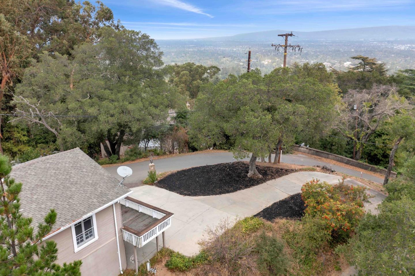 19000 Overlook Road Los Gatos, CA 95030 - Photo 12 of 56 a view of a house with a yard and street