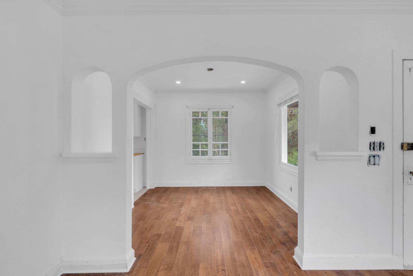 19000 Overlook Road Los Gatos, CA 95030 - Photo 14 of 56 a big room with wooden floor and windows