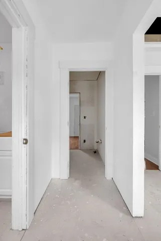 a view of a room with closet and wooden floor