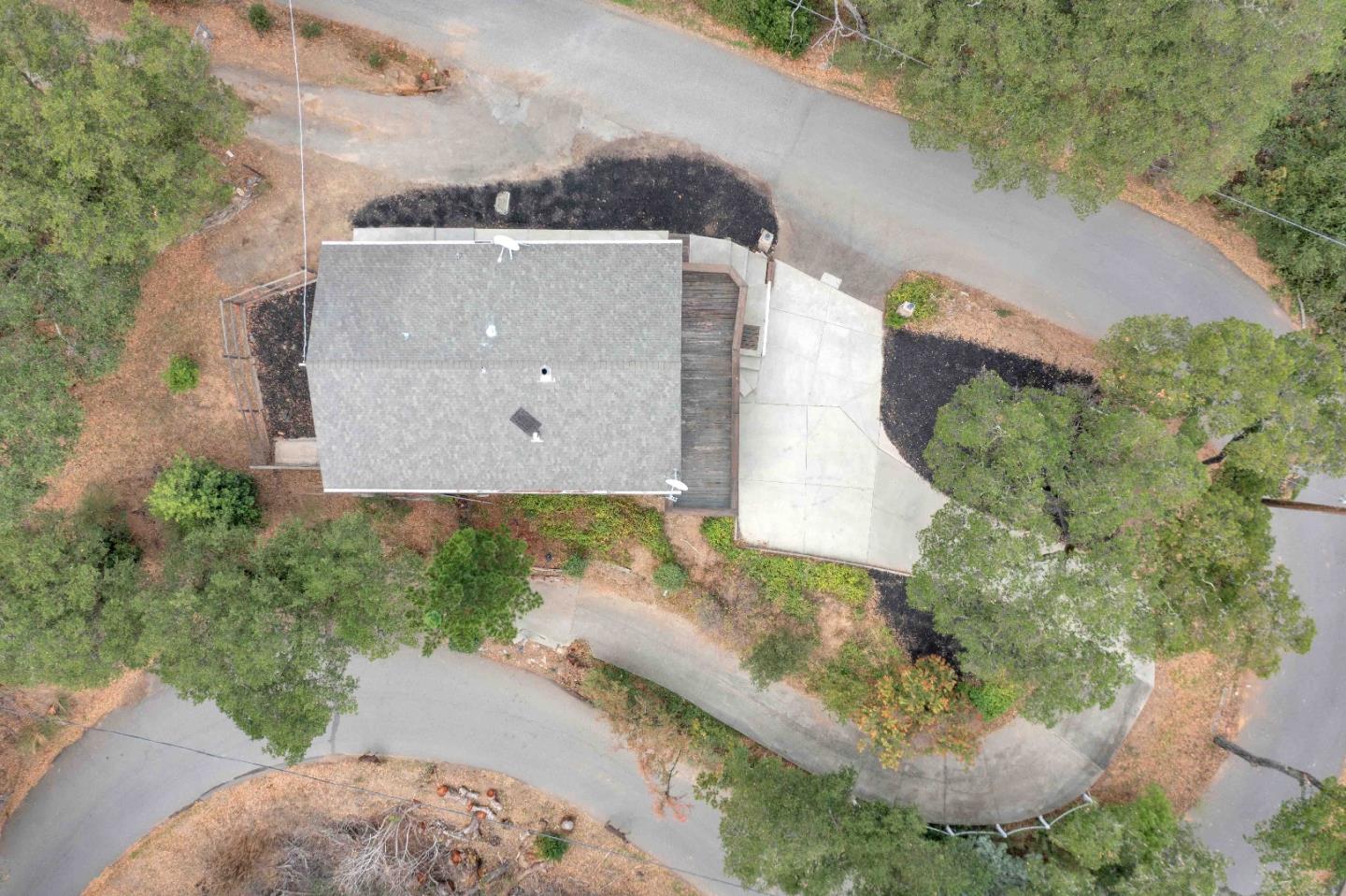 19000 Overlook Road Los Gatos, CA 95030 - Photo 36 of 56 an aerial view of a house with a yard and a garage