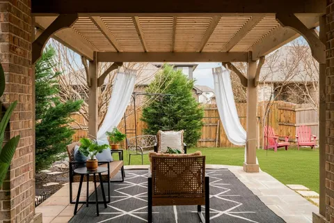 a view of yard with seating space
