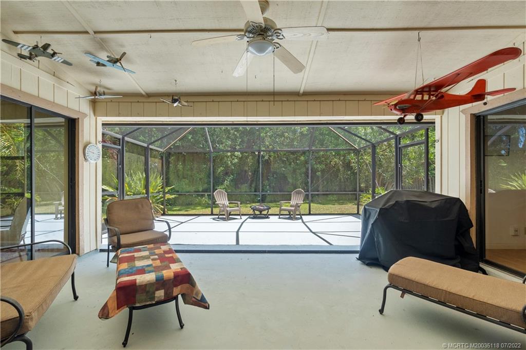 6870 Southeast Raintree Avenue Stuart, FL 34997 - Photo 19 of 28 Screened porch