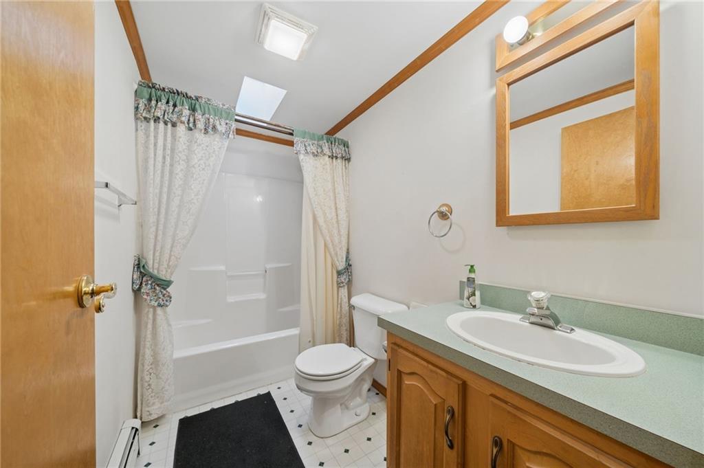 2127 Bethel Church Road Indiana, PA 15701 - Photo 13 of 46 a bathroom with a granite countertop sink toilet and shower