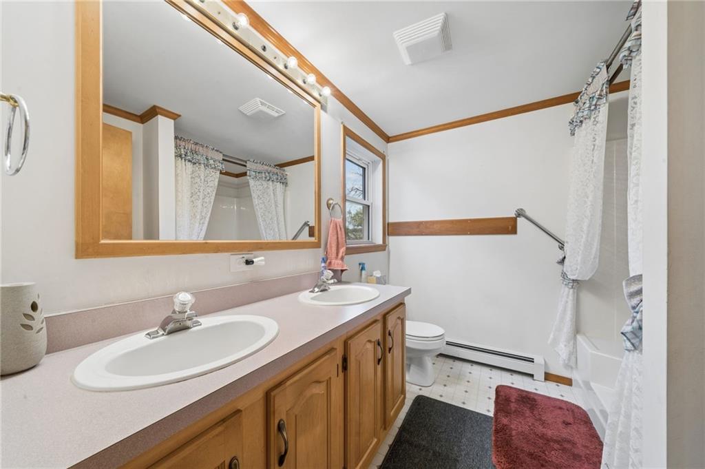 2127 Bethel Church Road Indiana, PA 15701 - Photo 16 of 46 a bathroom with a double vanity sink and mirror