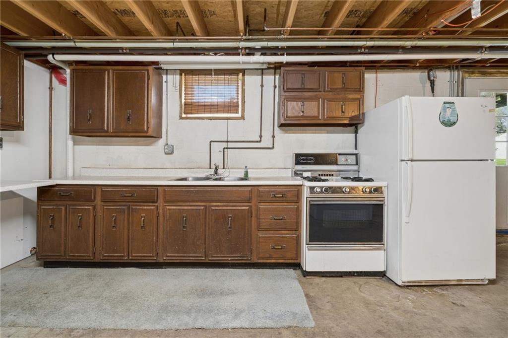 2127 Bethel Church Road Indiana, PA 15701 - Photo 19 of 46 a kitchen with stainless steel appliances granite countertop a refrigerator and a stove
