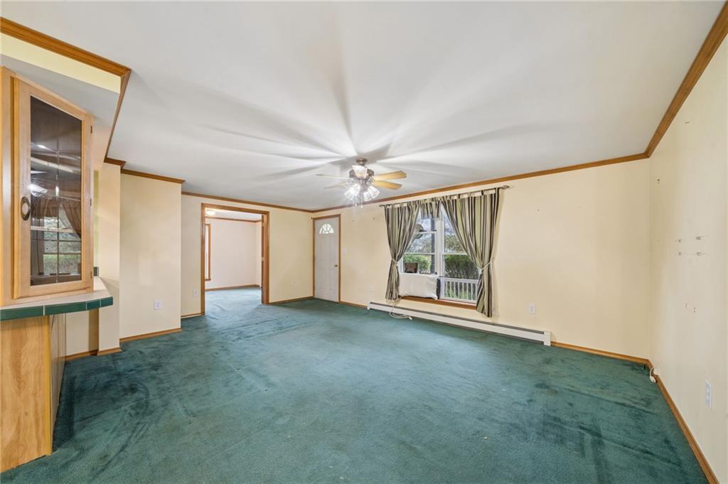 2127 Bethel Church Road Indiana, PA 15701 - Photo 2 of 46 an empty room with windows and chandelier fan