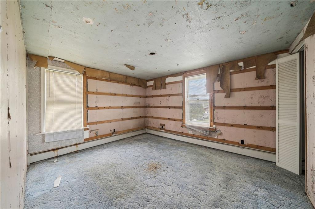 2127 Bethel Church Road Indiana, PA 15701 - Photo 35 of 46 an empty room with white walls and windows
