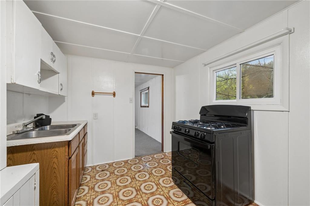 2127 Bethel Church Road Indiana, PA 15701 - Photo 40 of 46 a kitchen with a stove and a sink