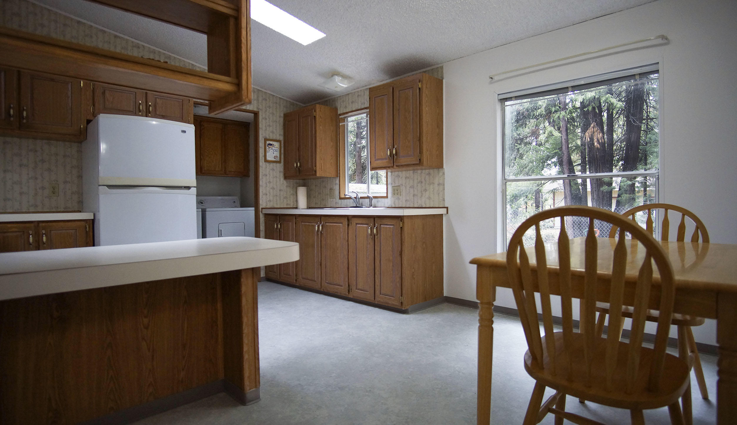 8497 Starlite Pines Road Shingletown, CA 96088 - Photo 16 of 22 Kitchen Dining Room View