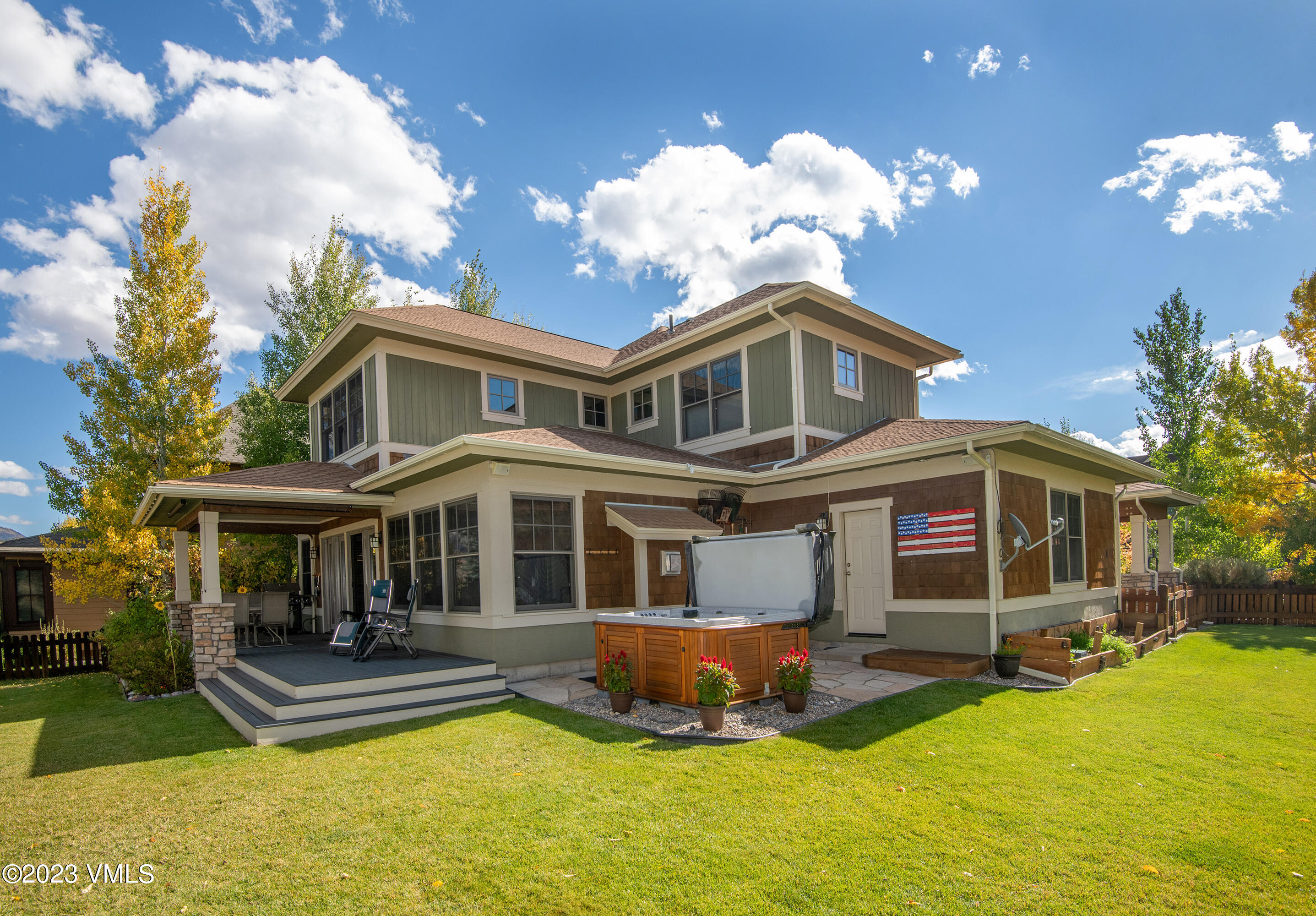346 Palmer Loop Eagle, CO 81631 - Photo 1 of 63 a front view of a house with swimming pool