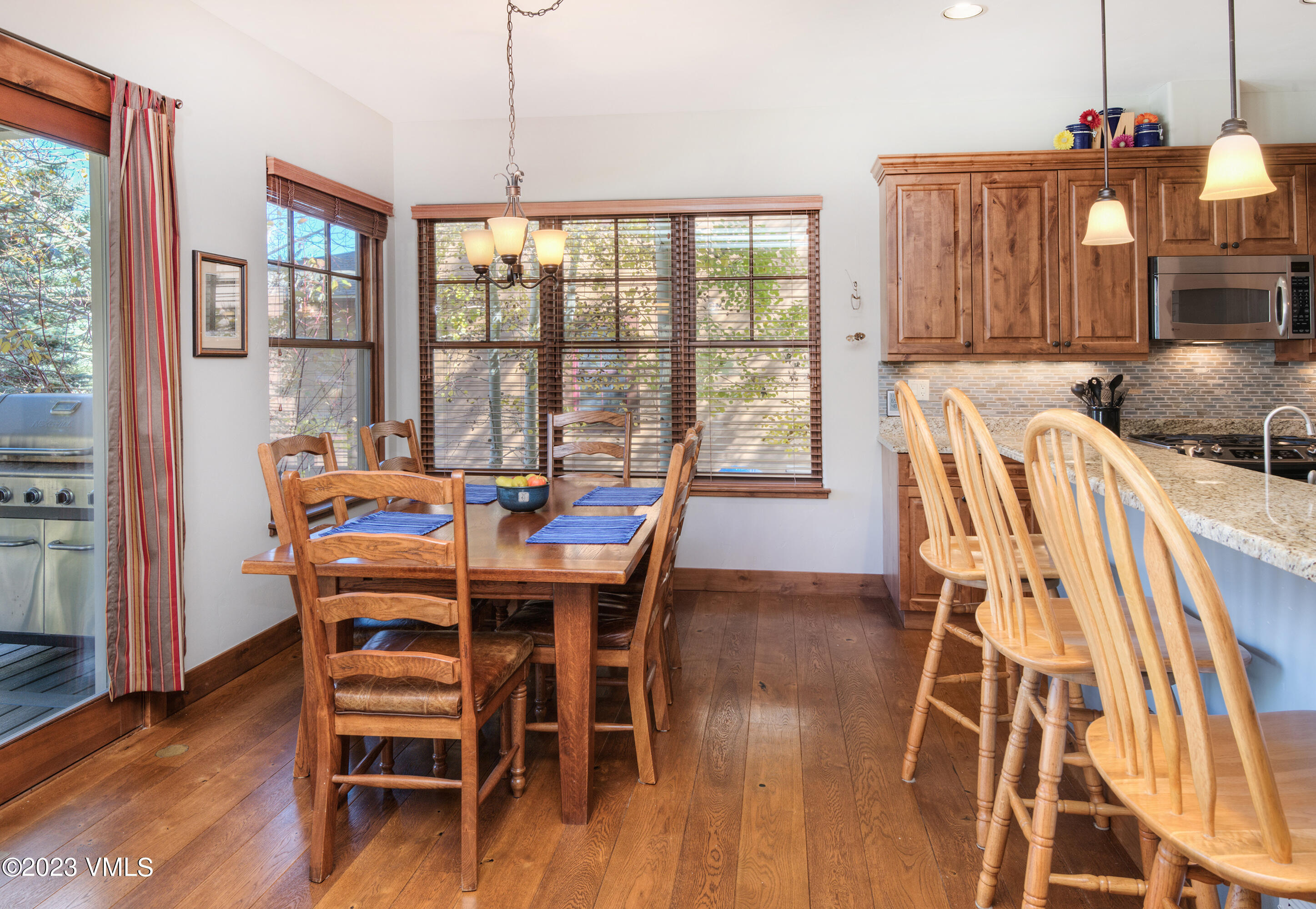 346 Palmer Loop Eagle, CO 81631 - Photo 13 of 63 a dining room with furniture window wooden floor