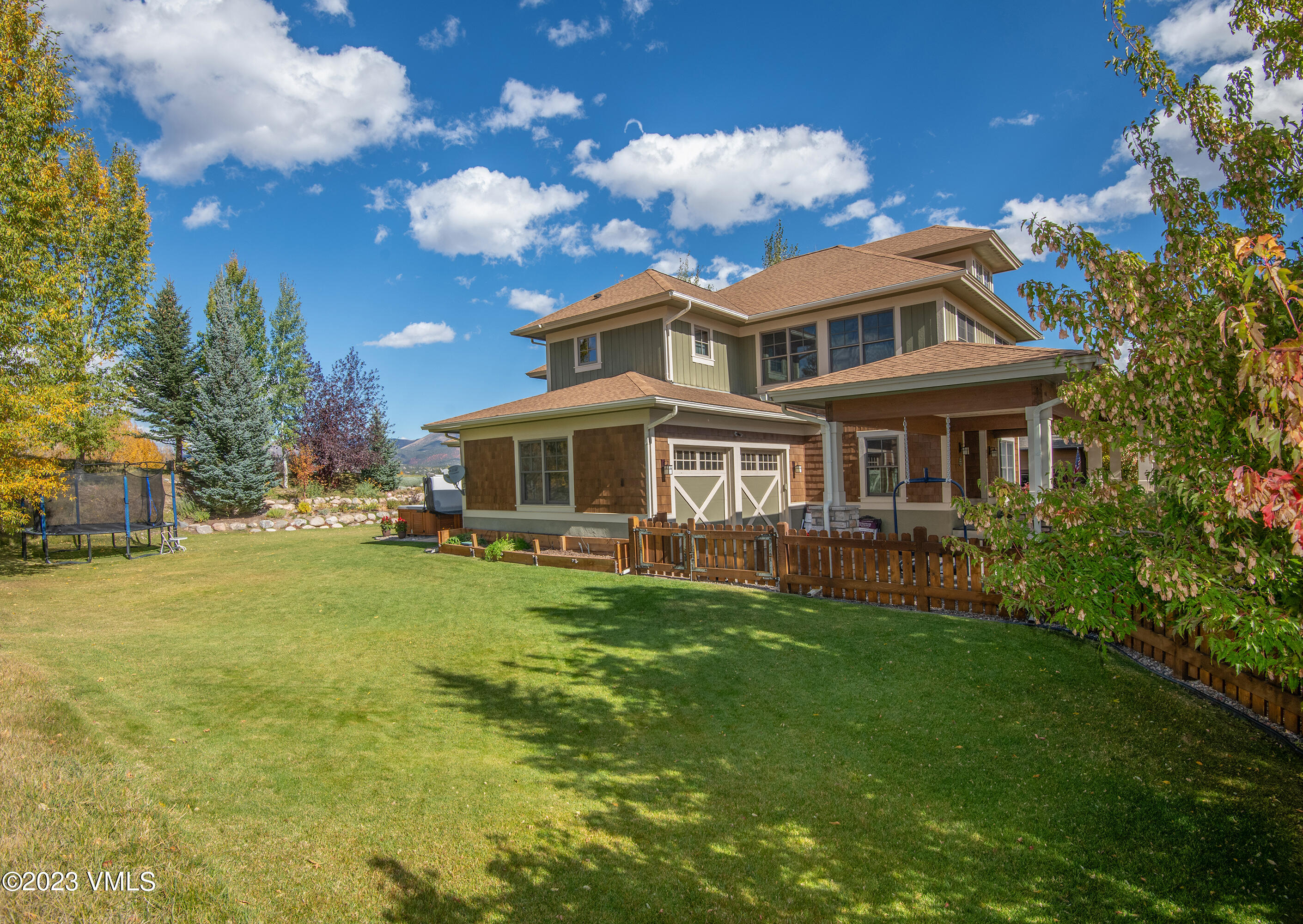 346 Palmer Loop Eagle, CO 81631 - Photo 3 of 63 a front view of a house with a garden