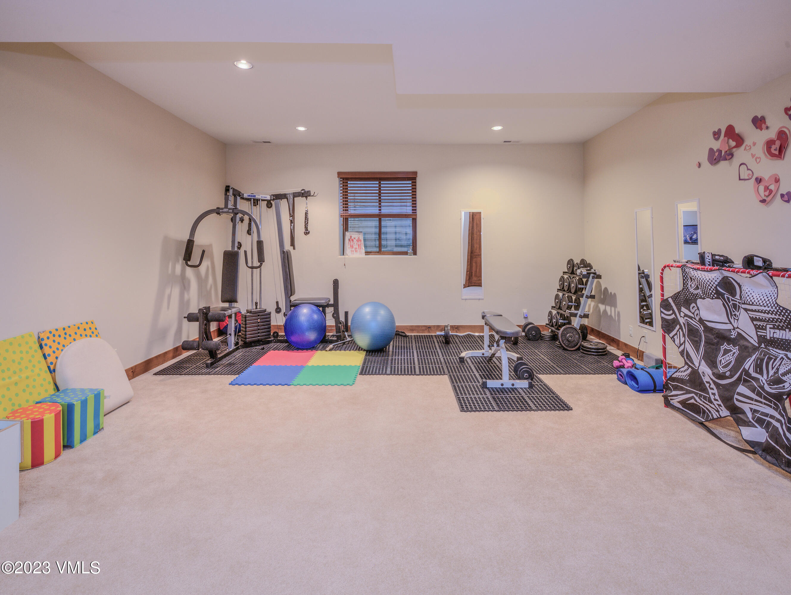 346 Palmer Loop Eagle, CO 81631 - Photo 43 of 63 a bedroom with furniture and gym equipment