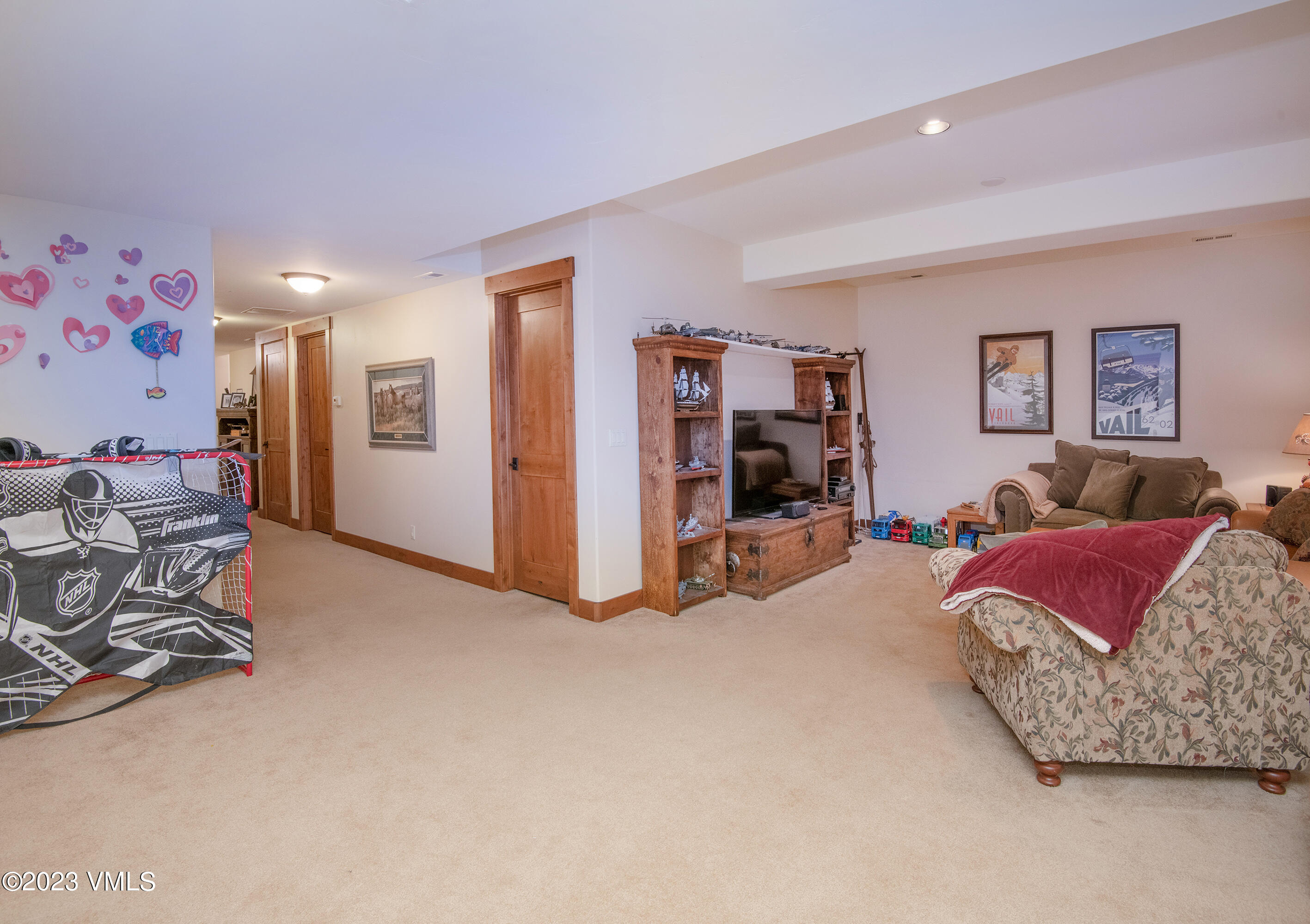 346 Palmer Loop Eagle, CO 81631 - Photo 44 of 63 a bed room with a bed and a couch