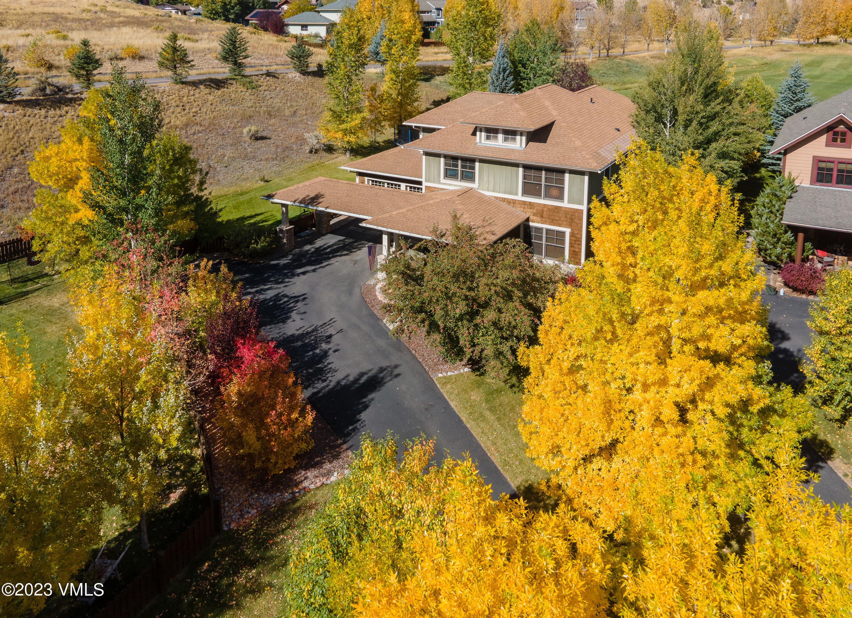 346 Palmer Loop Eagle, CO 81631 - Photo 56 of 63 an aerial view of a house with a yard and swimming pool