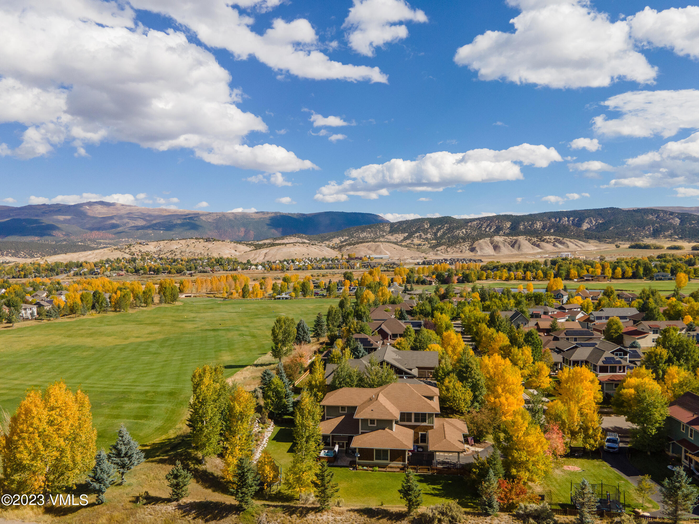 346 Palmer Loop Eagle, CO 81631 - Photo 58 of 63 a view of a city with lots of residential buildings ocean and mountain view in back