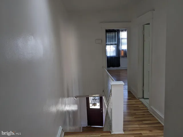 a bathroom with a shower and a mirror