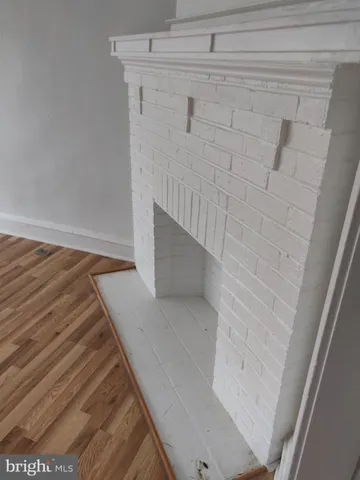 a kitchen with stainless steel appliances granite countertop cabinets and window
