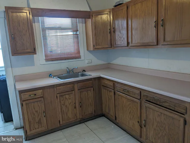 a kitchen with cabinets